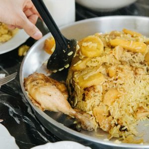 Close-up of a traditional biryani dish served in a wok at a restaurant in İstanbul.